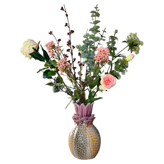 gekleurde vaas met kunstbloemen